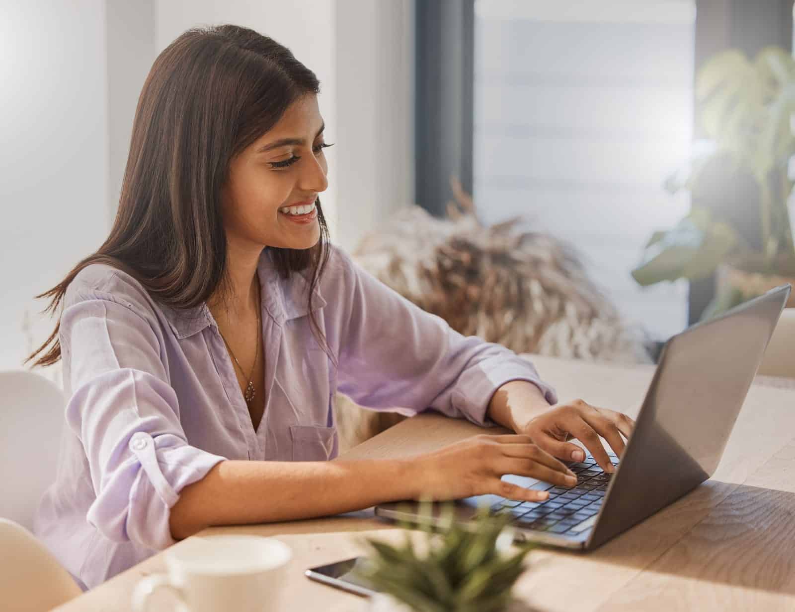 Business owner exploring tender opportunities on a laptop